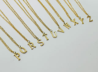 Halskette mit Aqua-Herz und goldenen Buchstaben